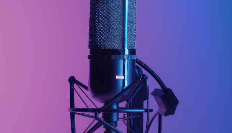 A microphone with the caption "Dafna Goes National"